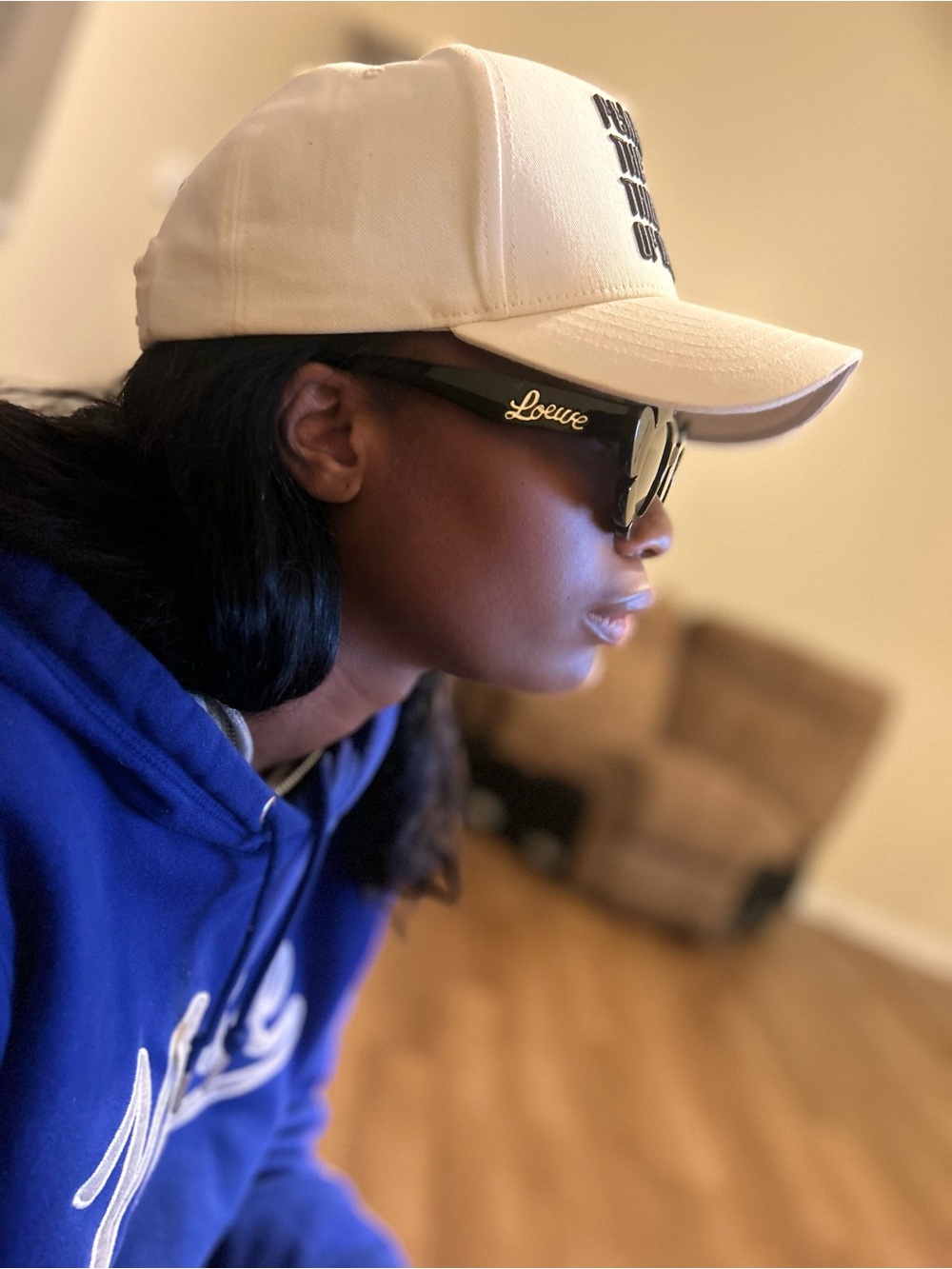 Loewe Black Frame Sunglasses with Gold Logo